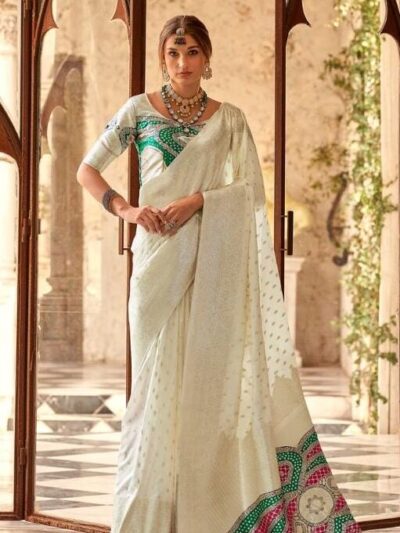 Opulent Regal White Silk Saree with Intricate Embellishments and Vibrant Motifs