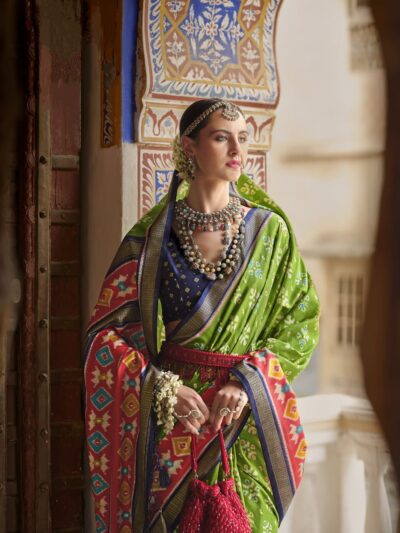 Green Exquisite Mercerized Sigma Silk Saree with Vibrant Motifs and Aqua Finish